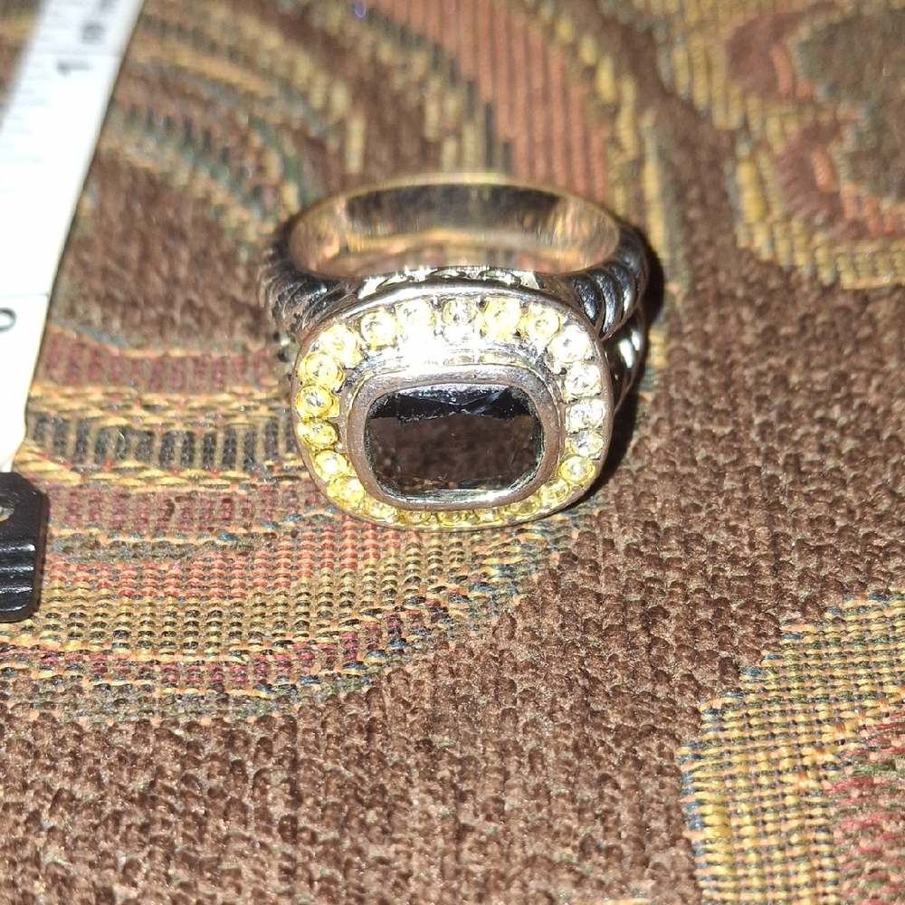 Elegant Silver and Black Ring with Gold Accents